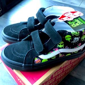 KidS Halloween vansBrand new in box never worn.  Sk8-Mid. Glow in the dark!